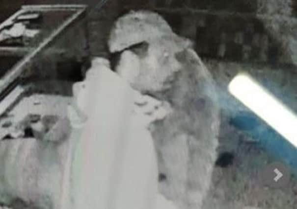 Police would like to speak to the man, pictured, in connection with their investigation into a burglary at a mobile phone shop on Queen Street, Southwell.