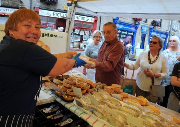 Bolsover Food and Drink Festival.
Tricia Lees serves up pies from the Kevin's Pies stall.
