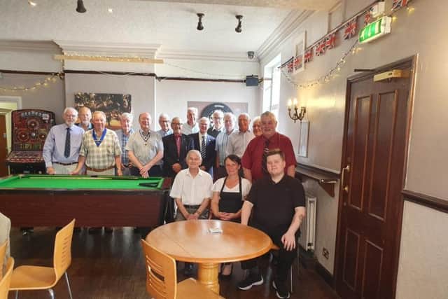 Members of the probus club, with staff members from the Plough Inn.(bottom row)