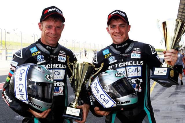 The Birchall brothers are pictured with their race trophy