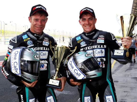The Birchall brothers are pictured with their race trophy