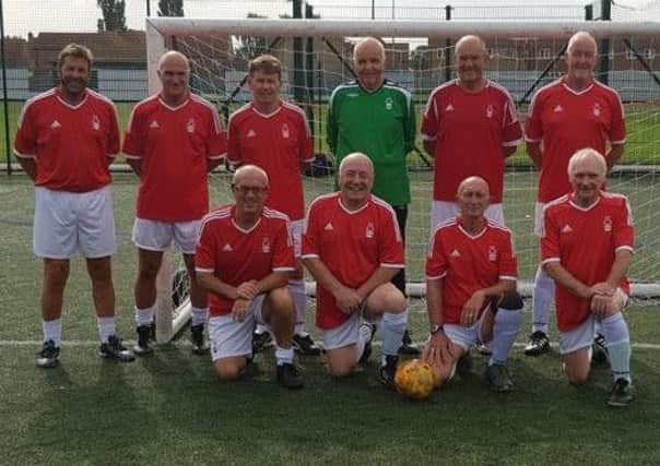 The victorious Mansfield Senior Reds over-50s walking football team.