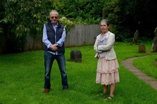 Concerns over plans to sell off part of the graveyard at Holy Trinity Church, Kimberley, pictured is Gordon Barksby and Parish Councillor Susan McEntee