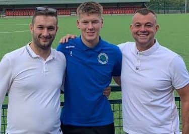 Pictured is Sherwood Colliery goalkeeper Josh Turton, who was awarded man of the match by club sponsor Mike Staton (Staton Mortgage & Protection) and club chairman Gareth Bull.