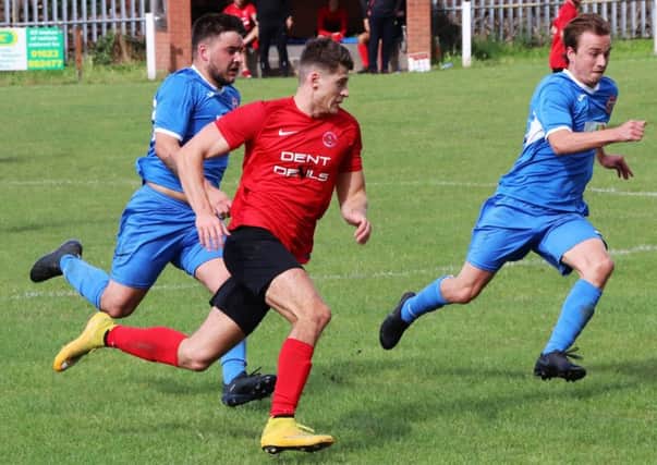 Action from Ollerton Town's 1-1 draw at home to Worsbrough Bridge Athletic. (PHOTO BY: Nigel Owen).