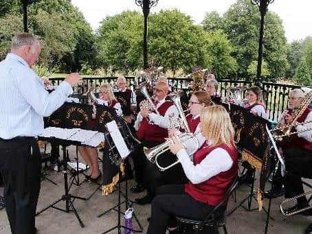 Geof Benson conducts the Pleasley colliery band.