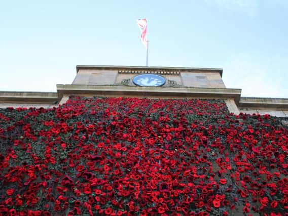 The Old Town Hall in Market Place, Mansfield, was blanketed in poppies for Remembrance Day 2018.