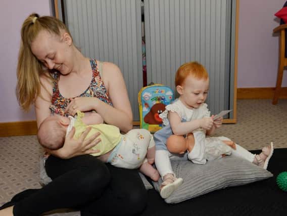 Pictured is Lyndsey Tutin with four month old Arwen and 18 month old Aiofe