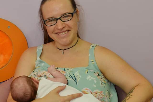 Pictured is Xephni Butler with five week old Hailey