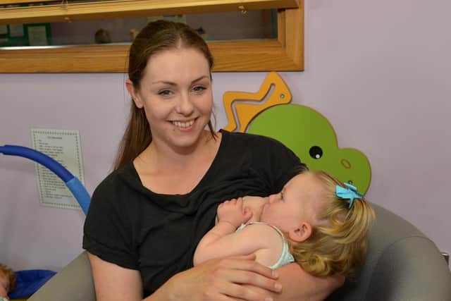Pictured is Jodie Blinstone with 18 month old Ava Blinstone