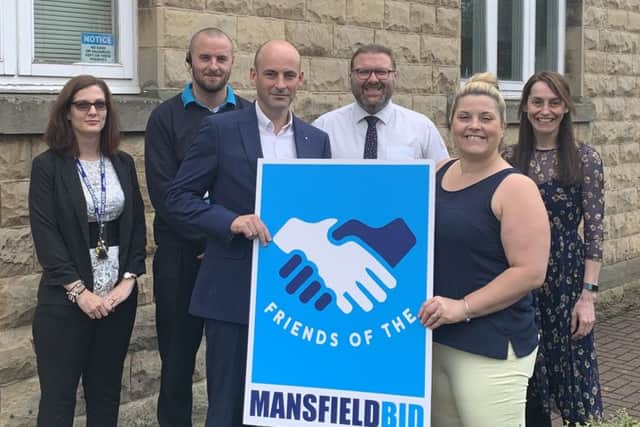 Director Dean Parrish enrols Churchside Insurance as a member of the Friends Of BID initiative. He is pictured with Nikki Rolls and Tom Wilson, of BID, and Churchside employees Sian-Ann Pestell, Damian Booker and Emily Boler.