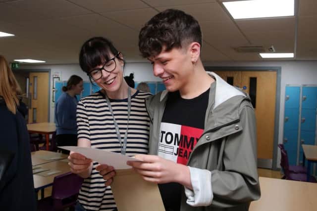 Head of year Angela Finn with student Harry Hempshall.