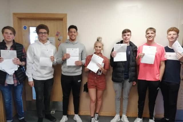 Pupils celebrate their results.