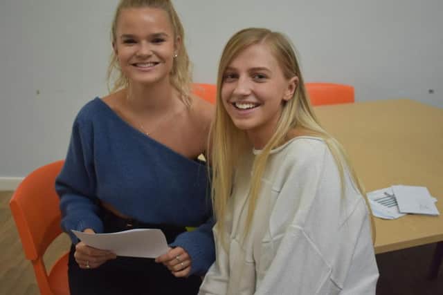 Joseph Whitaker pupils celebrate their results.