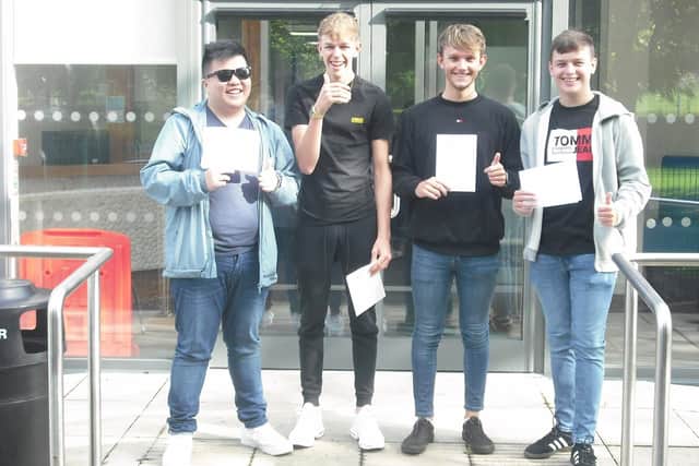 Ray Chen, Mason Broadhead, Sam Fairweather and Tom Youd celebrate their results at Meden College.