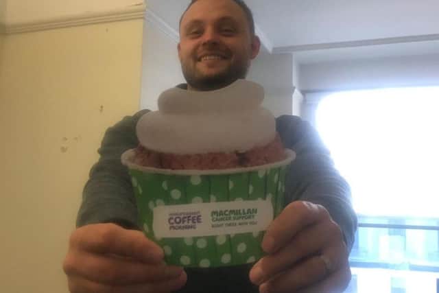 Mansfield MP Ben Bradley with a coffee morning poster.