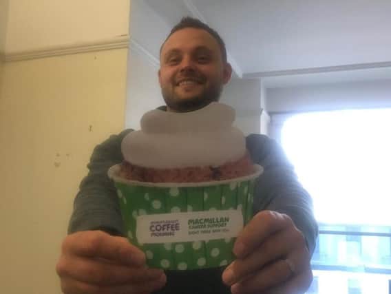 Mansfield MP Ben Bradley with a coffee morning poster.