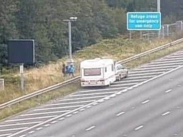 One lane is closed between J29a and J30 due to a vehicle breakdown.