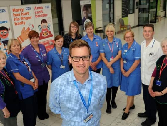 Richard Mitchell the Chief Executive of Sherwood Forest Hospitals NHS Trust with staff at Kings Mill Hospital.