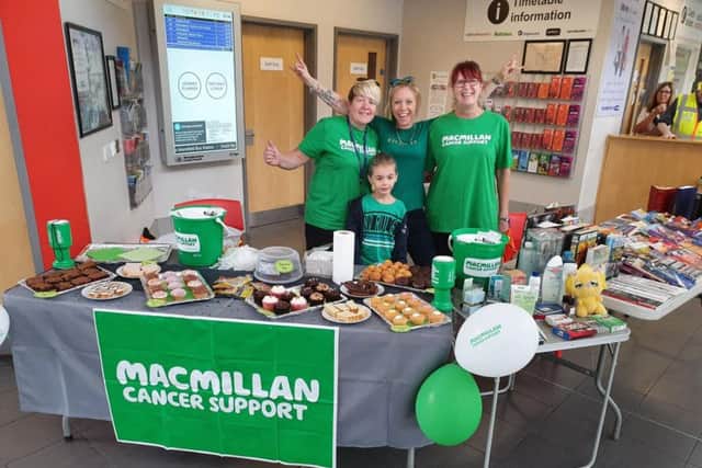 People wear green in Mansfield to support Macmillan.