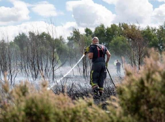 Firefighters tackling a blaze at Oak Tree Heath last summer.