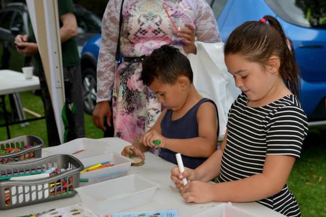 Zeke Appleby, five, and Alicia Molloy, seven, learn about nature with the Maun Conservation Group