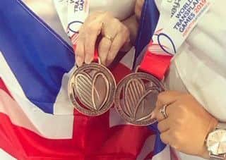 The bronze and gold medals Diana Reddy picked up in Gateshead.