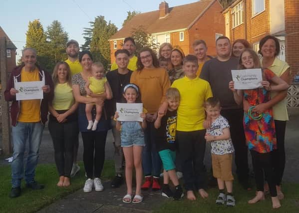 Leons family celebrate the donation of £1,000 from Persimmon Homes.