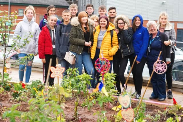 Members of the National Citizen Service group in the community garden at Kings Mill Hospital.