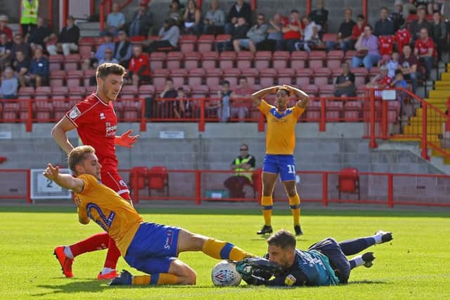 Picture Gareth Williams/AHPIX LTD, Football, Sky Bet League Two, Crawley Town v Mansfield Town, Checkatrade.com Stadium, Crawley, UK, 14/09/19, K.O 3pmHoward Roe>07973739229Mansfield's Danny Rose wastes a glorious chance as he overruns the ball and collides with Crawley keeper Glenn Morris