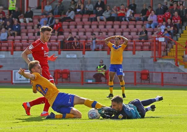 Picture Gareth Williams/AHPIX LTD, Football, Sky Bet League Two, Crawley Town v Mansfield Town, Checkatrade.com Stadium, Crawley, UK, 14/09/19, K.O 3pm

Howard Roe>07973739229

Mansfield's Danny Rose wastes a glorious chance as he overruns the ball and collides with Crawley keeper Glenn Morris