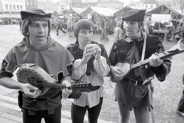1981: This trio are playing a tune at Mansfields medieval market? Did you see them there?