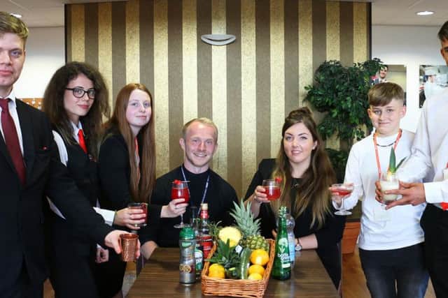 Students presenting some of the new cocktails they created