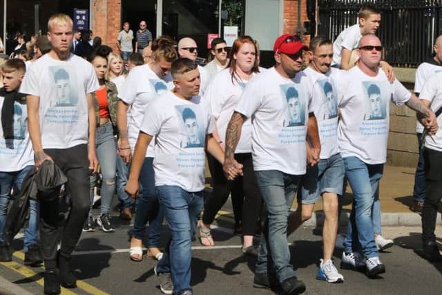 Theprocession was followed by mourners who wore t-shirts bearing Liam's picture, with the message: "always loved, never forgotten, forever missed."