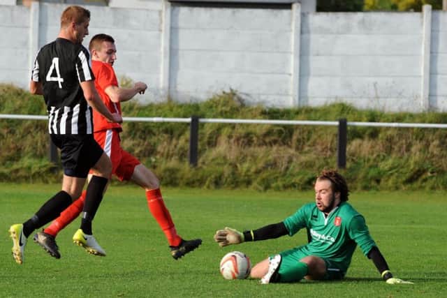 Goalkeeper Levi Owen, who made some smart saves for Ollerton Town.