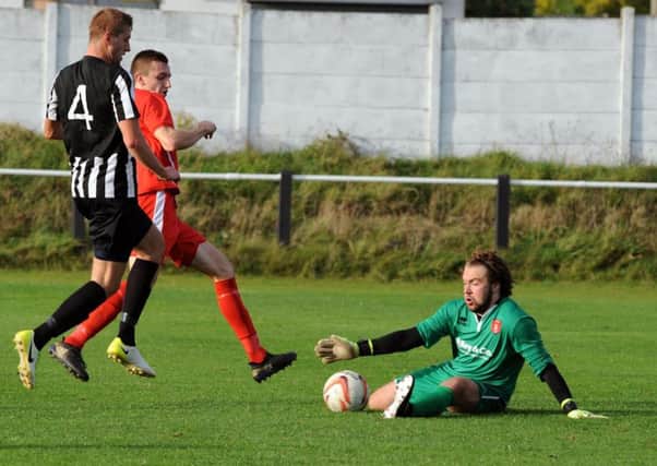 Goalkeeper Levi Owen, who made some smart saves for Ollerton Town.