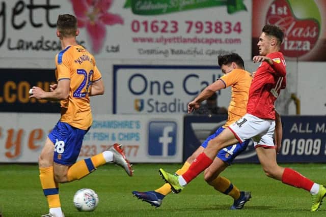 Mansfield Town v Crewe Alexandra, Mansfield's James Clarke has a shot on goal