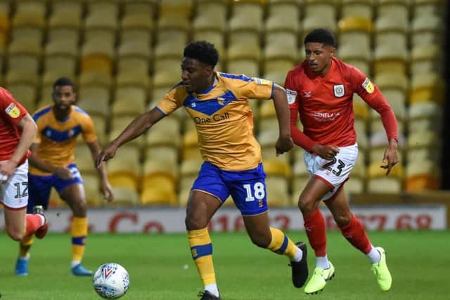 Mansfield Town v Crewe Alexandra, Mansfield's Dopa Afolayan gets away from Crewe's Travis Johnson