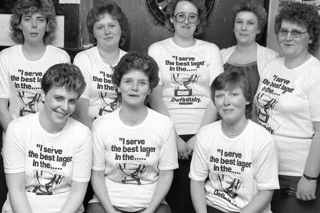 1986: This smiley bunch look ready to win their next match, they play for Bridge Taverns ladies darts team. Did you play for this pub?