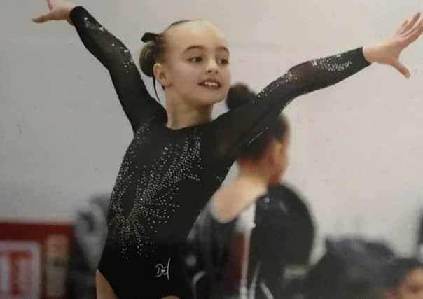 Ten-year-old Charlotte Cooke is regarded as a talented gymnast with a successful future.