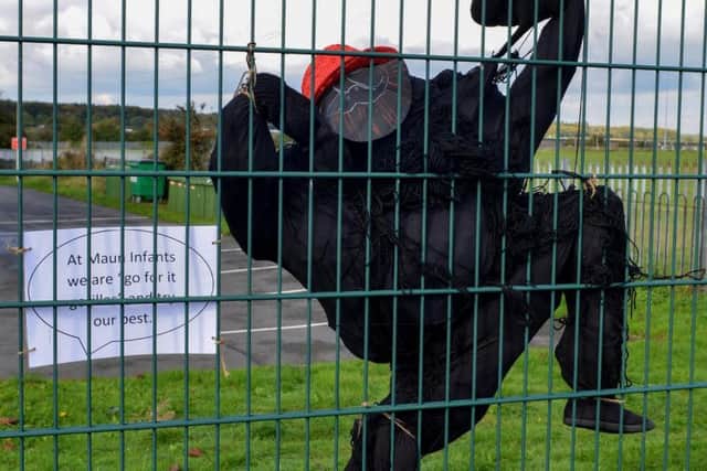 Maun Infants Go For It Gorilla scarecrow.