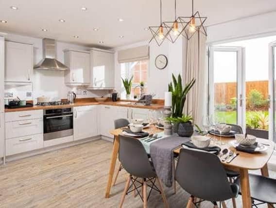 A typical kitchen and dining area in a Barratt Homes property at Berry Hill
