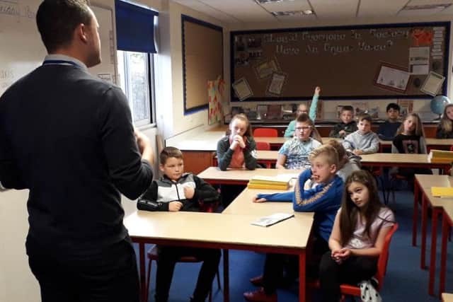 Mr Bradley at the school.