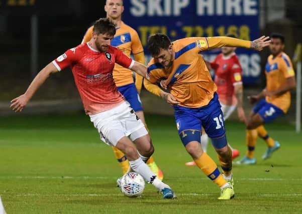 Picture: Andrew Roe/AHPIX LTD, Football, Sky Bet League Two, Mansfield Town v Salford City, One Call Stadium, Mansfield, UK, 22,10/19 K.O 7.45pm

Mansfield's Andy Cook battles with Salford's Joey Jones
Howard Roe>07973739229