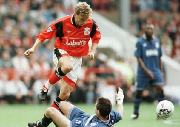 17 SEP 1995:  LARS BOHINEN OF NOTTINGHAM FOREST KNOCKS THE BALL PASSED THE CHALLENGE OF ANDERS LIMPAR OF EVERTON   DURING NOTTINGHAM FOREST V EVERTON IN THE FA PREMIERSHIP AT CITY GROUND. Mandatory Credit: Shaun Botterill/ALLSPORT