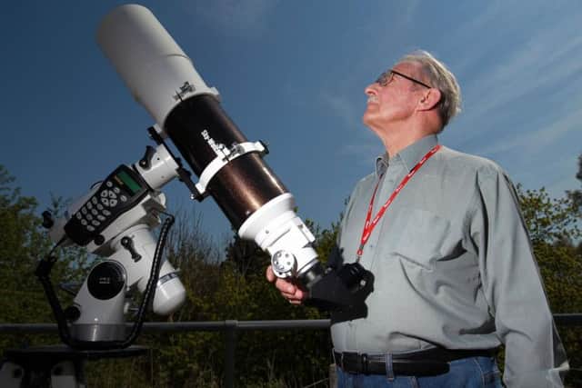 David Collins observing the Transit of Mercury across the Sun at the Sherwood Observatory in Sutton. Photo: Chris Etchells
