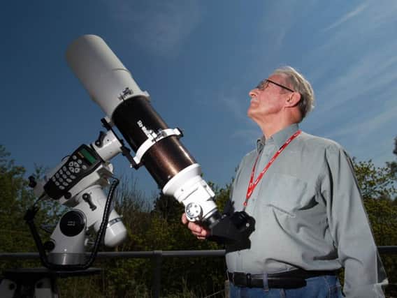 David Collins observing the Transit of Mercury across the Sun at the Sherwood Observatory in Sutton. Photo: Chris Etchells