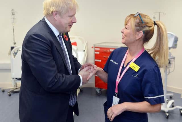 Boris Johnson visits Mansfield Kings Mill hospital. Boris Johnson speaking to specialist critical nurse Mandy.