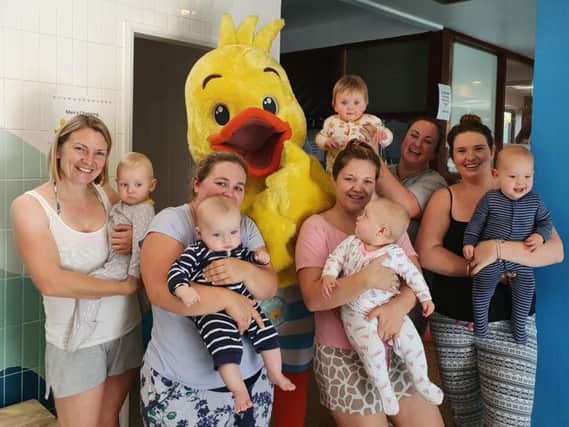 Parents and children from Puddle Ducks swim school, ready for their PJ swim