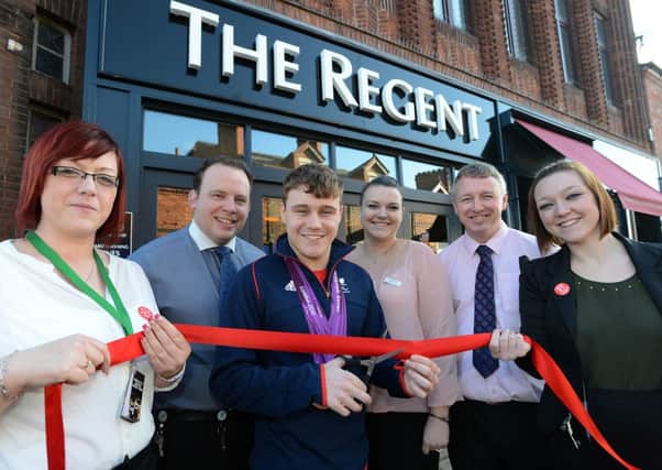 Opening of The Regent in Kirkby in Ashfield, opened by paralympic medal winner Ollie Hynd.  Pictured from left is Sam Smith, manager Jon Sellars, Ollie Hynd, manager Rachel Sellars, area manager Gavin Gill and team leader Jade Harpham.